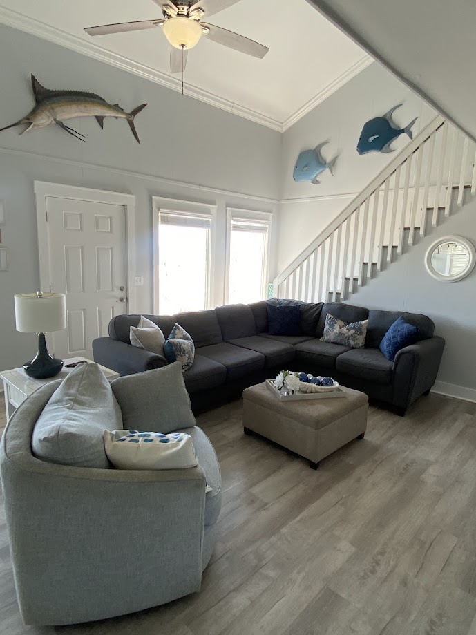 A cozy living room with a grey sectional sofa